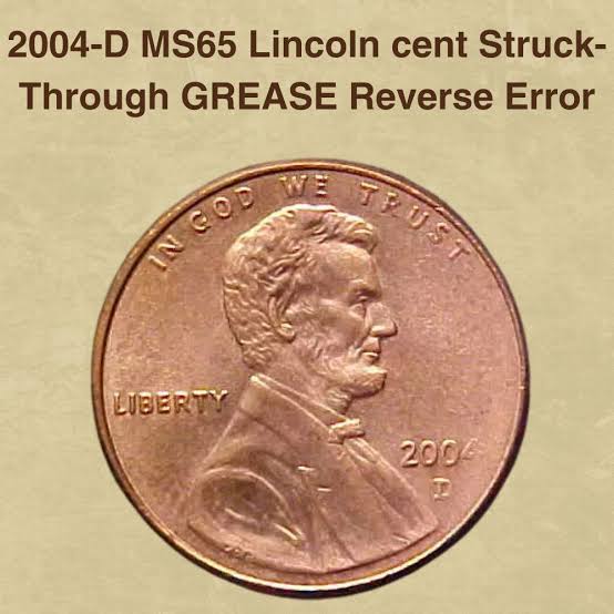 2004 penny struck through grease error showing weak or missing reverse design elements where die grease blocked the strike